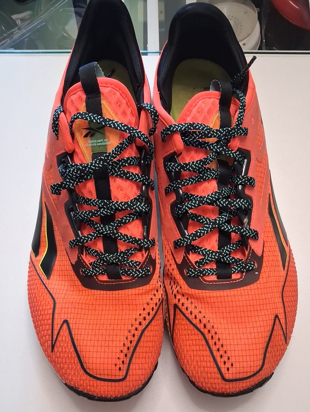 Reebok Men's Bright Orange Running Sneakers with Black Accents
